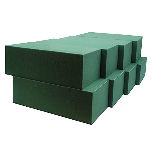 Green floral foam blocks stacked, used for flower arrangements.