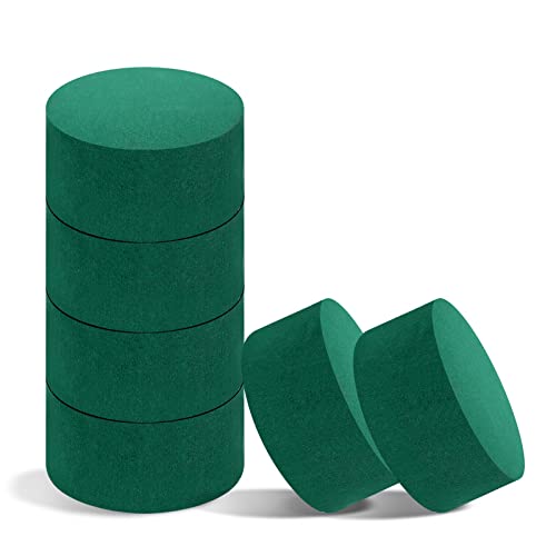 Six round, green floral foam blocks, stacked and displayed, for use in fresh or artificial flower arrangements